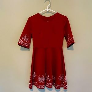 Red Flare dress with hem detail